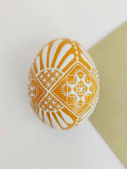 Yellow hand-painted eggs