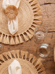 Add a little texture with The Colombia Collective's placemats. These fringed beauties are just what's needed to bring some fun and frolic to the table. Collagerie.com