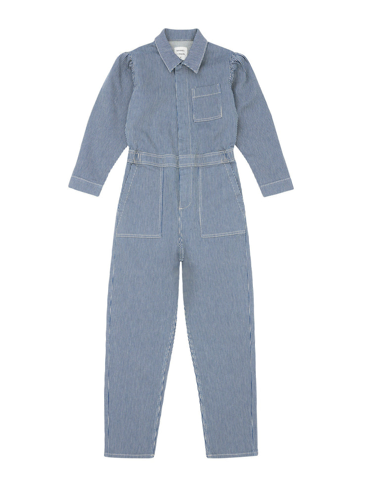 Relaxed fitting striped blue denim Seventy + Mochi jumpsuit with soft gathering at the back and a straight leg. The perfect transitional piece. Collagerie.com