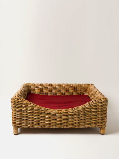 Kalinko Kway raised rattan pet bed at Collagerie
