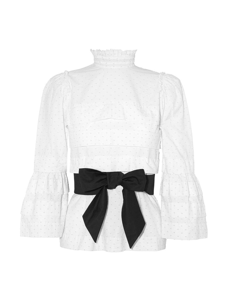 Lightweight, made from swiss cotton and finished with a black bow tie belt, this Anna Mason blouse is a comfortable, flattering hero piece for every occasion. Collagerie.com