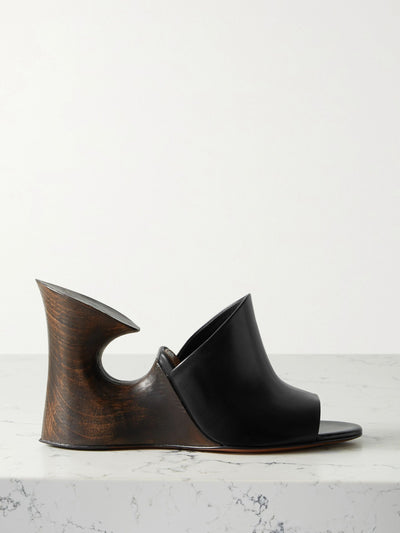 Alaïa La Sculpture patent leather wedged mules at Collagerie