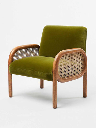 Oliver Bonas Green velvet and rattan armchair at Collagerie