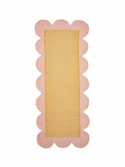 Oliver Bonas Mustard woven scalloped wool runner rug at Collagerie