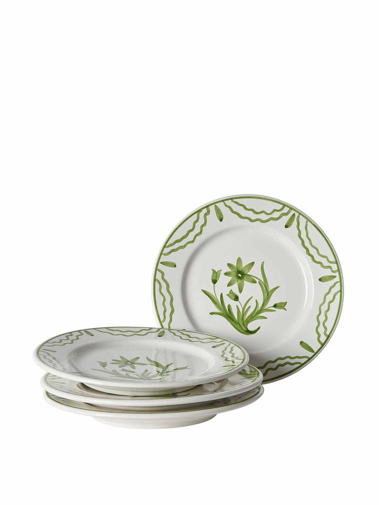 Bring a hint of floral fancies to your dining set-up with Penny Morrison plates and bowls in this elegant green summer flower set. Collagerie.com