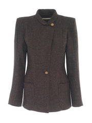A classic, timeless Anna Mason jacket made from shetland wool, designed to fit with all your preloved and new styles featuring shoulder-pads. Collagerie.com