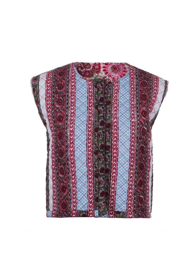Reversible pink and red quilted gilet is sure to add a little boho-chic to any outfit. Perfect cotton gilet for the Summer. Colourful with floral details | Collagerie.com
