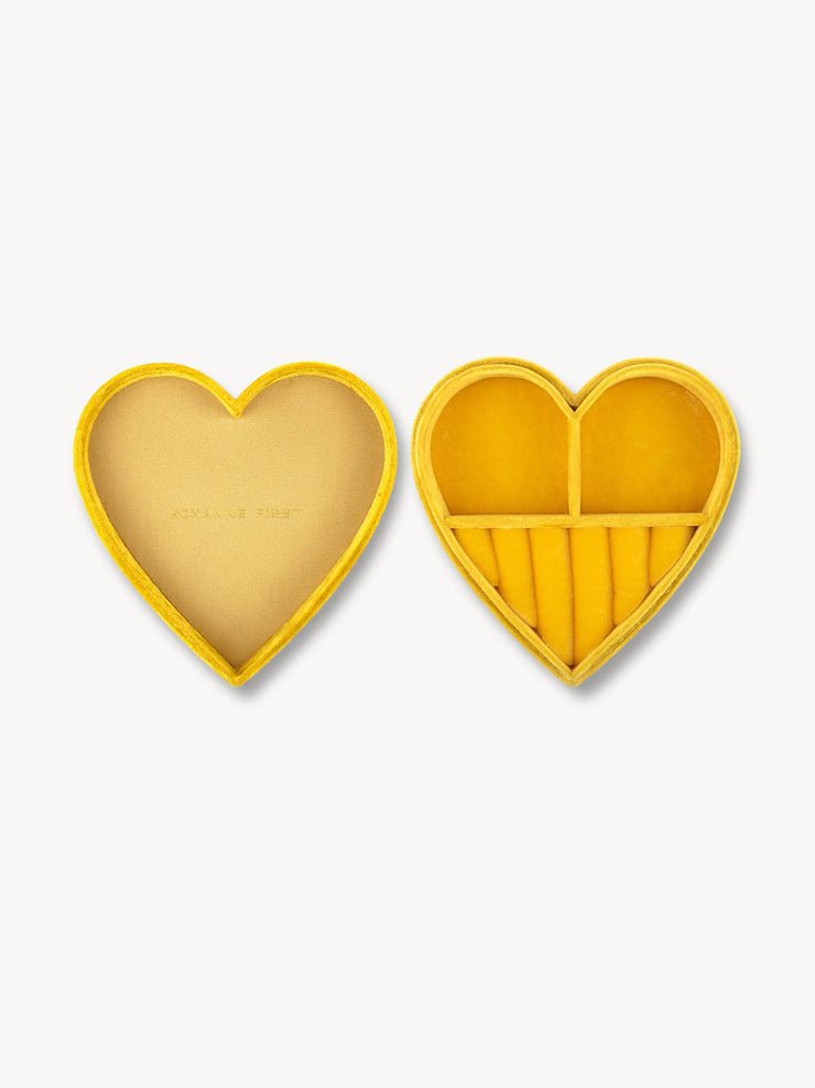 A little bit sunshine for your bedside table. A bright, yellow heart-shaped velvet Roxanne First jewellery box for all your favourite pieces. Collagerie.com