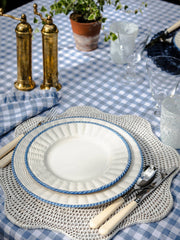 Scalloped rattan placemat in Brown