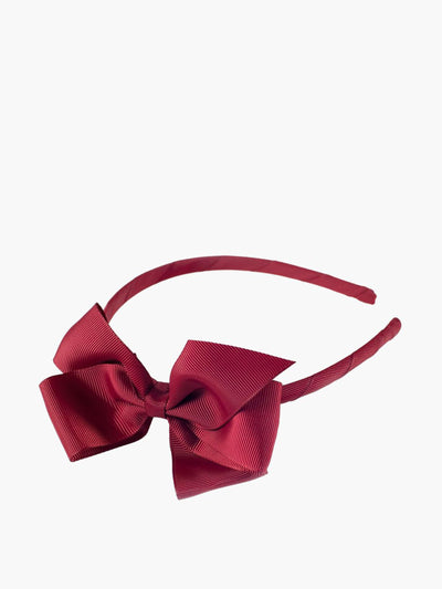 Amaia Rust red children's side-bow headband at Collagerie