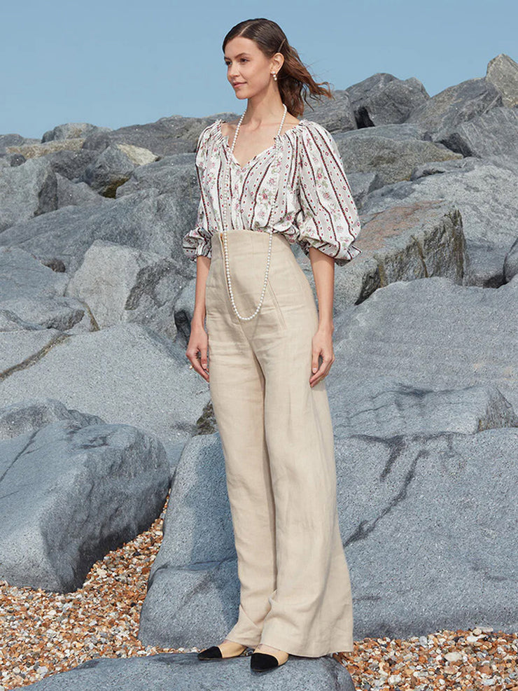 Made from linen, these wide-leg Anna Mason trousers are a comfortable, flattering piece to keep you cool while also professional. Collagerie.com