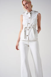 Seventy + Mochi's modern take on the 70s trend: this sleeveless white denim jacket. This is your must-have layering transitional piece. Collagerie.com