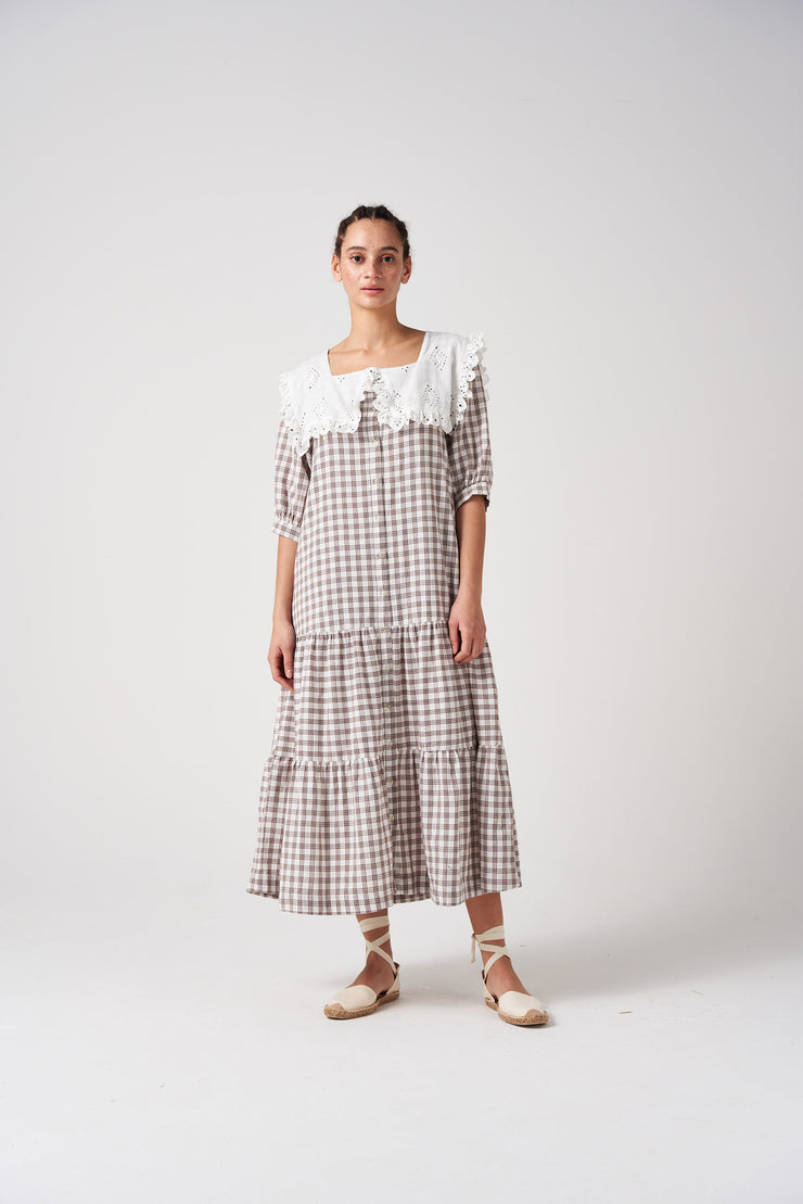 Your new summer to fall transitional dress by Seventy + Mochi. Featuring flattering tiers, square neckline, frill broderie anglaise collar and side pockets. Collagerie.com