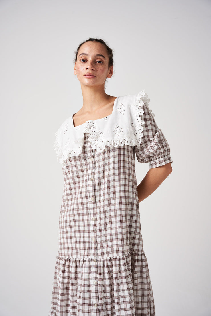 Your new summer to fall transitional dress by Seventy + Mochi. Featuring flattering tiers, square neckline, frill broderie anglaise collar and side pockets. Collagerie.com