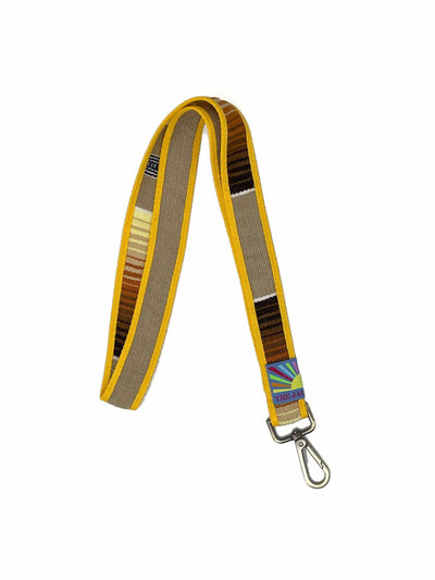 The Jacket Bar Mustard yellow key chain and phone strap at Collagerie