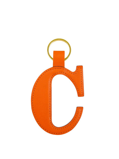 Noble Macmillan Tangerine leather alphabet keyring at Collagerie