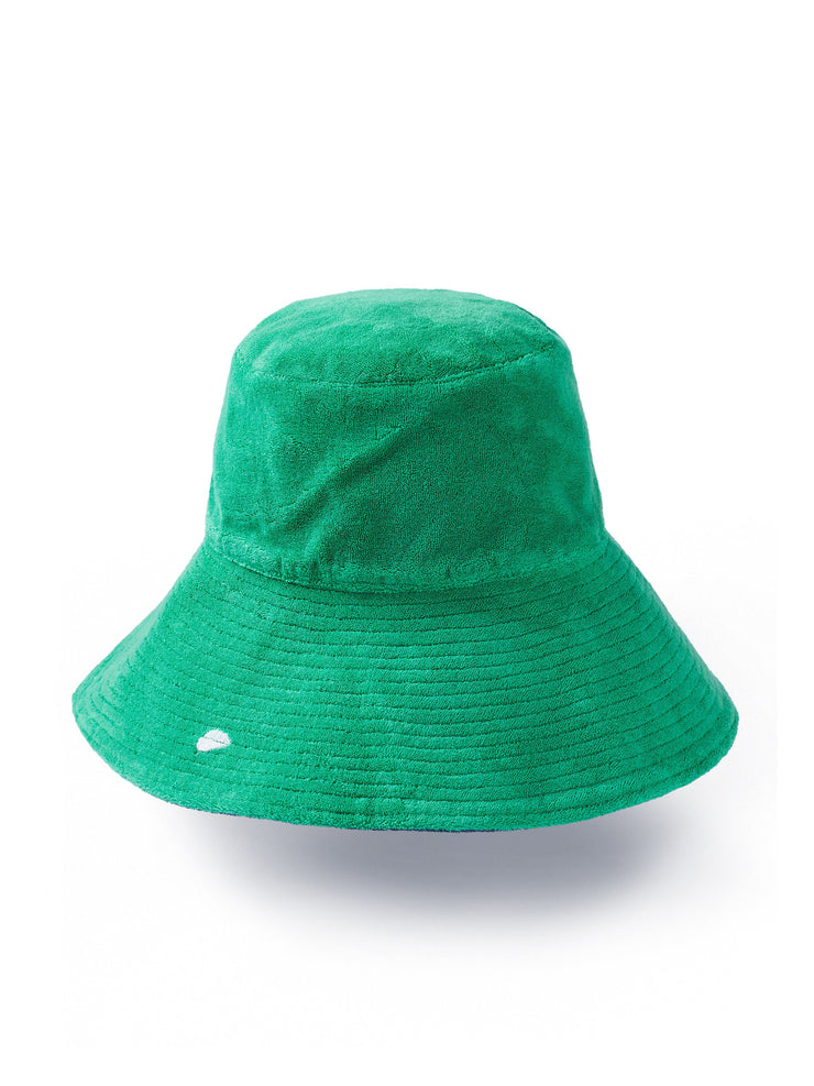 Reversible green and navy towelling bucket hat by Rae Feather. Great addition to your Summer wardrobe and made out of towelling cotton | Collagerie.com