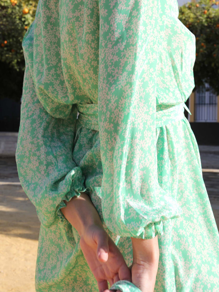 Green and white floral print paloma midi dress by Yolke. An optional cinched in waist with belt and gently flared sleeves. Perfect summer dress | Collagerie.com