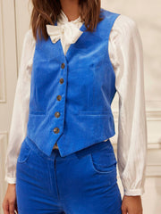 A classic corduroy Yolke waistcoat in electric blue that references traditional tailoring with a modern approach. Suited & booted in style. Collagerie.com