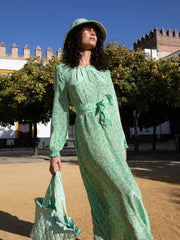 Green and white floral print paloma midi dress by Yolke. An optional cinched in waist with belt and gently flared sleeves. Perfect summer dress | Collagerie.com