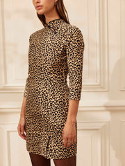 A mini cotton corduroy Yolke dress, featuring a playful leopard print. The ideal fun trans-seasonal contemporary occasion dress. Collagerie.com