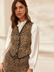 Embrace your rock 'n' roll side with this Studio 54 inspired leopard print cotton corduroy waistcoat from Yolke. Collagerie.com