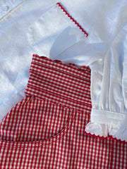 Red and white scalloped gingham shorts by Yolke. Made from Italian cotton gingham and sit high on the waist. Perfect summer shorts | Collagerie.com