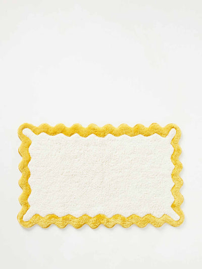 Anthropologie White and yellow bath mat at Collagerie