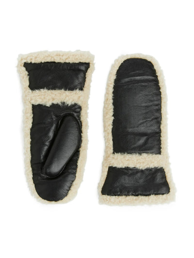 Arket Leather shearling mittens at Collagerie