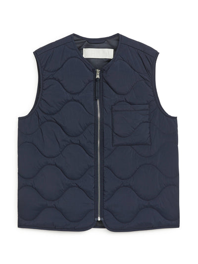 Arket Navy quilted liner vest at Collagerie
