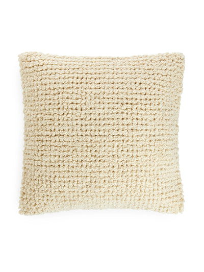 Arket White wool cushion at Collagerie