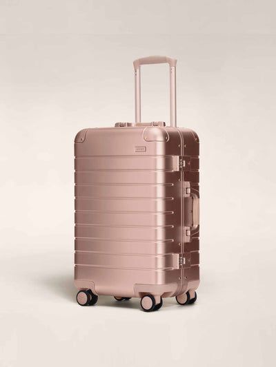 Away Rose gold aluminium carry on suitcase at Collagerie