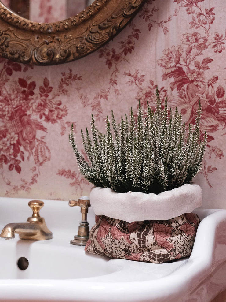 Pink printed linen basket