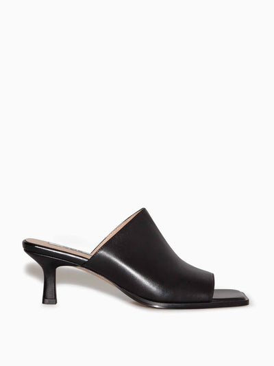 Cos Black leather mules at Collagerie