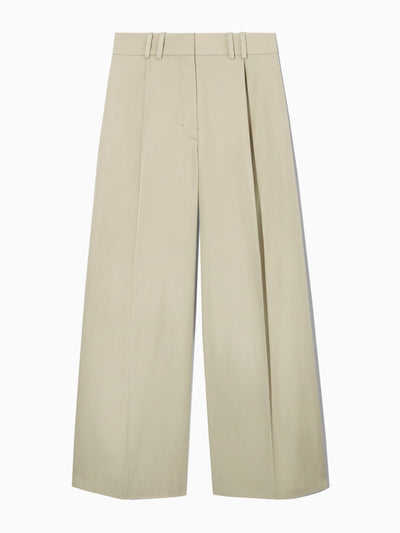 Cos Beige pleated trousers at Collagerie