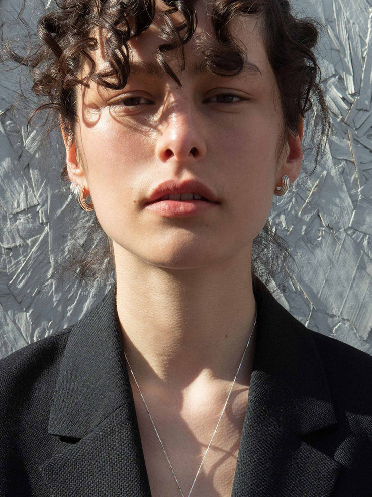 Medium gold non-conformist hoops