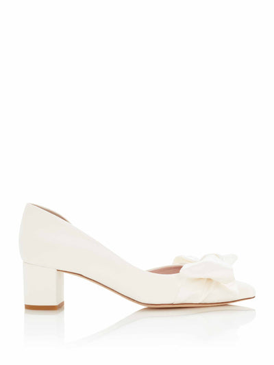 Emmy London Ivory suede pumps with satin bow at Collagerie