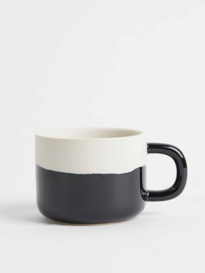 H&M Black and white mug at Collagerie