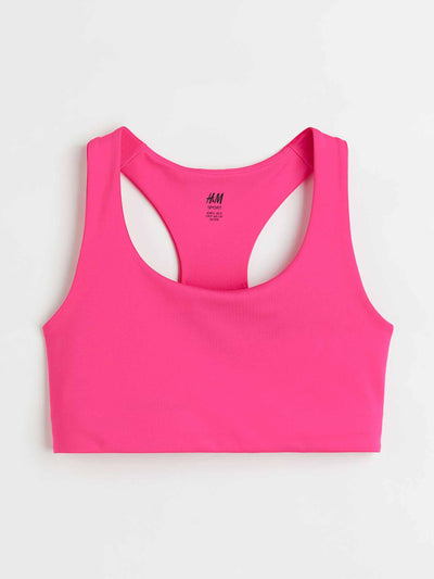 H&M Pink medium support sports bra at Collagerie