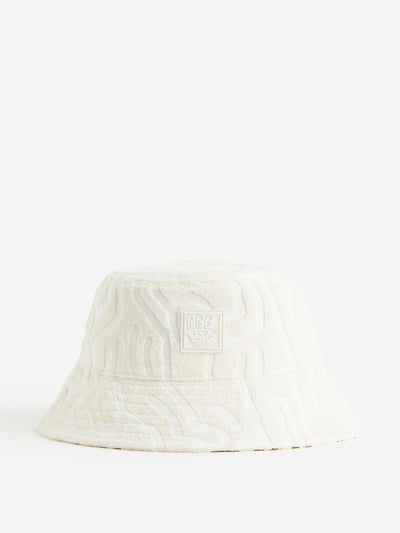 Keith Haring x H&M Patterned terry bucket hat at Collagerie
