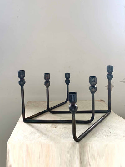 Il Buco Iron candelabra at Collagerie