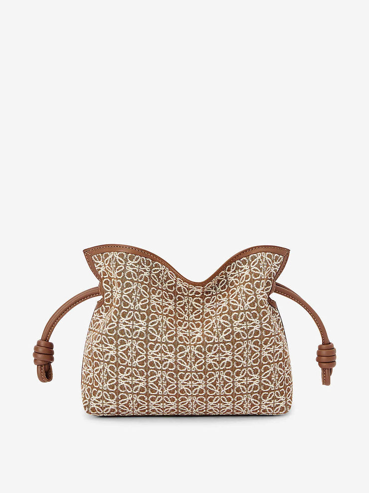Anagram jacquard and leather clutch bag