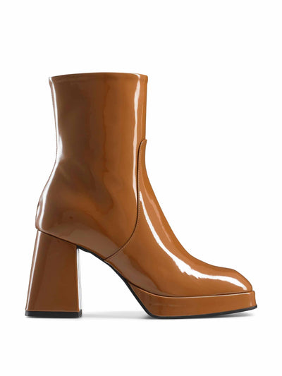 Russell & Bromley Flared heel platform boots at Collagerie