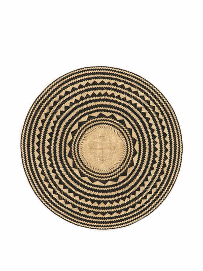 Washein Natural straw round placemats at Collagerie