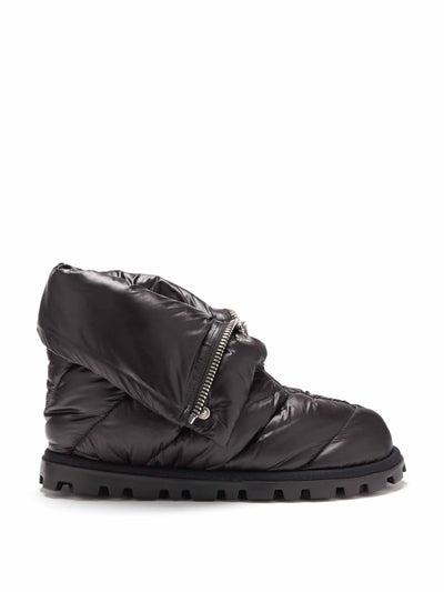 Miu Miu Zipped quilted ski boots at Collagerie