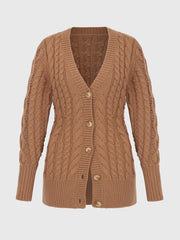 A cashmere-feel Emilia Wickstead cardigan in a tan yarn that fastens with tortoiseshell buttons. The tan hue works particularly well with denim or neutrals. Collagerie.com
