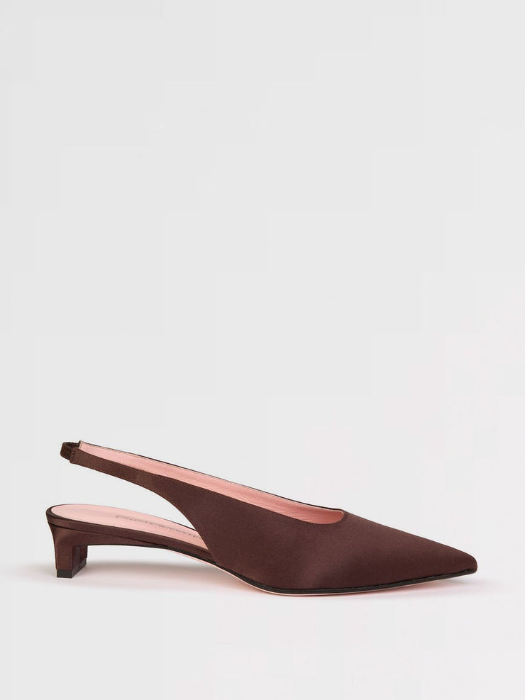 These Emilia Wickstead sling-backs featuring a moderate kitten heel are a secure and comfortable fit, deal for work or dancing the night away. Collagerie.com