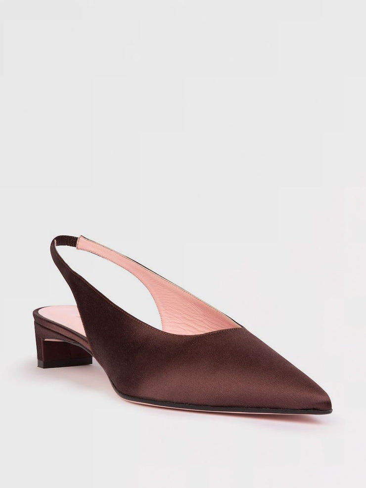 These Emilia Wickstead sling-backs featuring a moderate kitten heel are a secure and comfortable fit, deal for work or dancing the night away. Collagerie.com