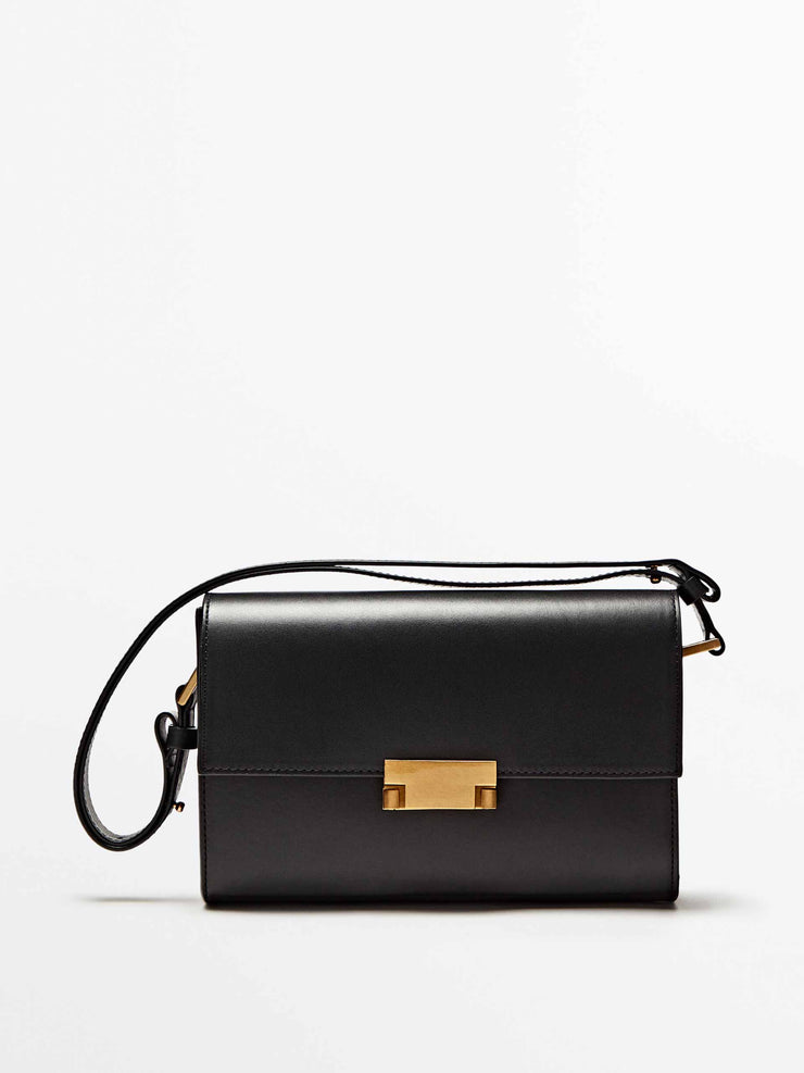 Black leather bag with gold clasp