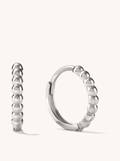 Mejuri White gold bobble huggie hoops at Collagerie